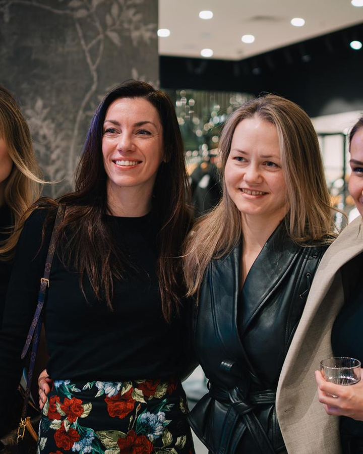 Guests smiling at an Imperfect CEO evening